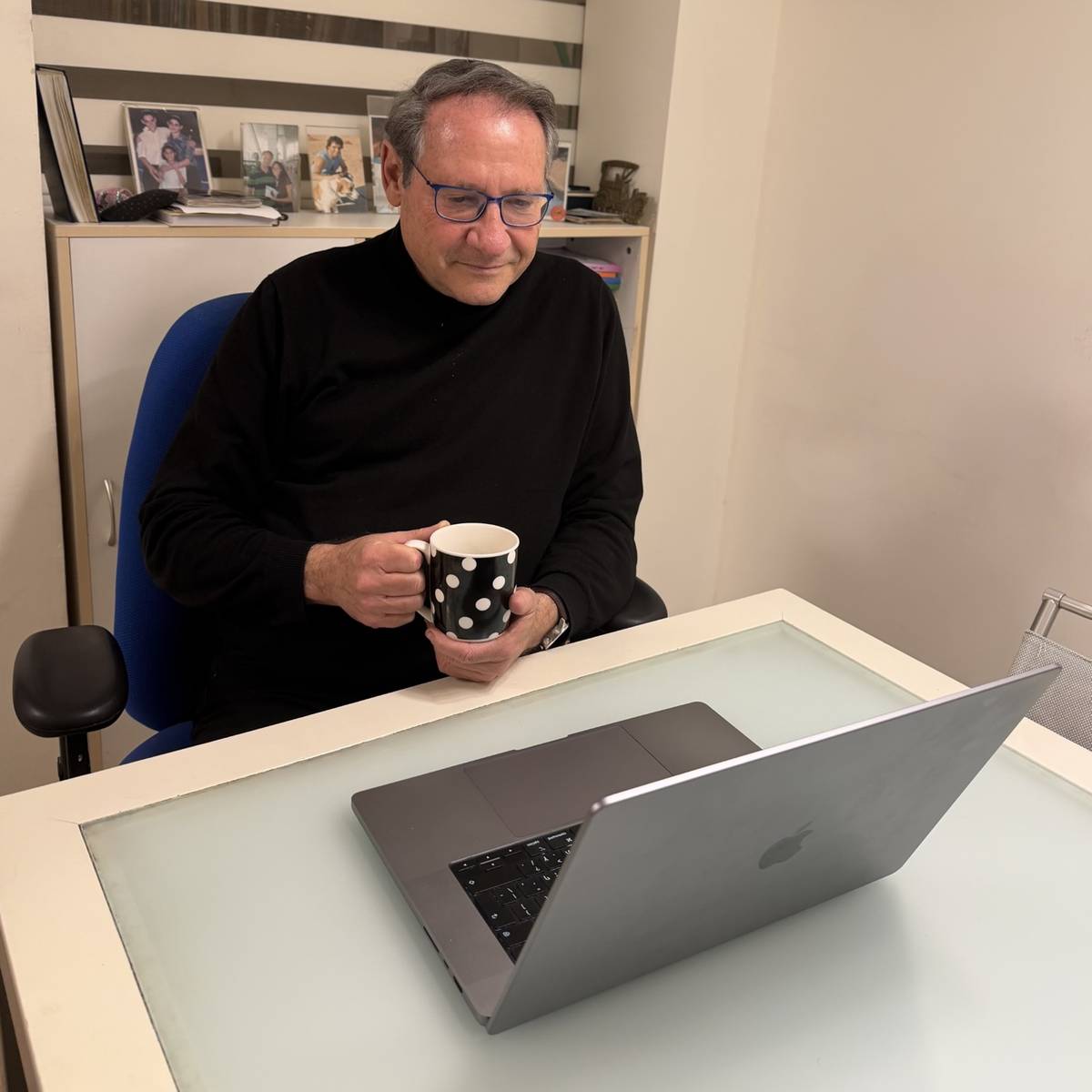 Danny Zach at his desk during his Life Story video interview.